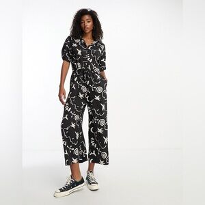 Monki Tie Waist Jumpsuit in Black and White Face and Moon Print